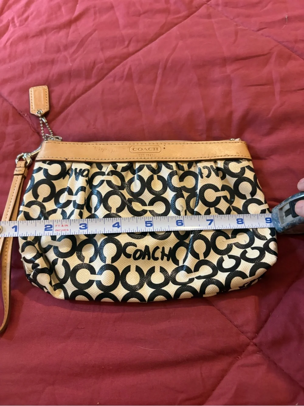 COACH Black and Cream Signature Canvas Wristlet with Tan Trim